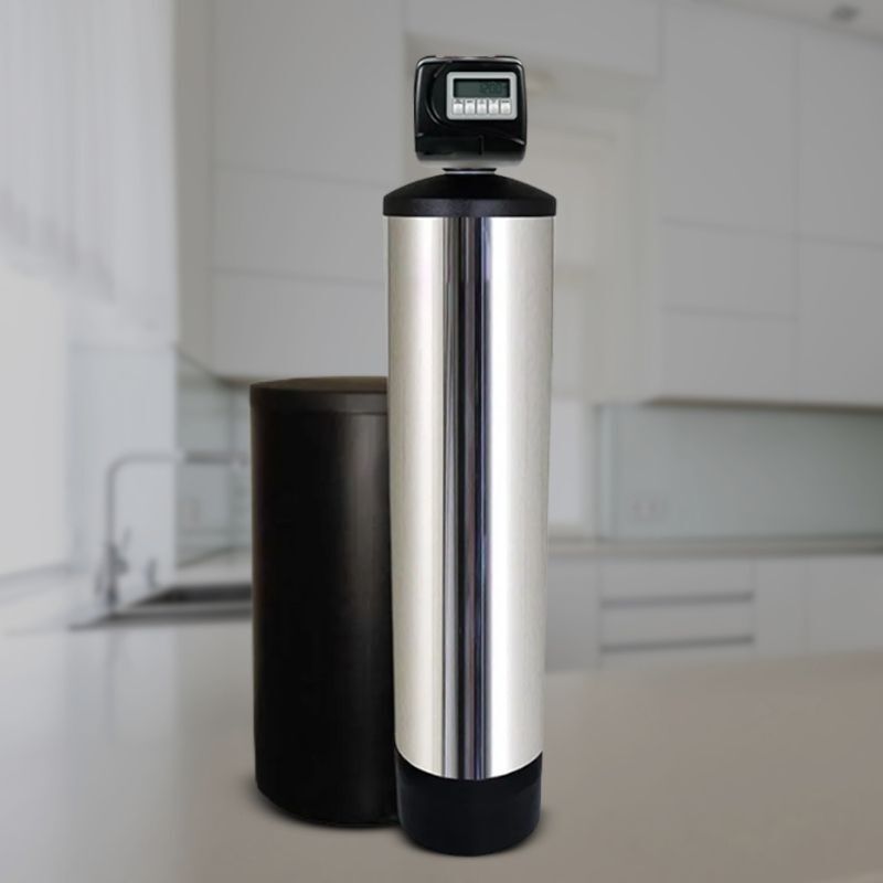 Certified technician setting up a whole-home water softener to improve water quality and protect appliances