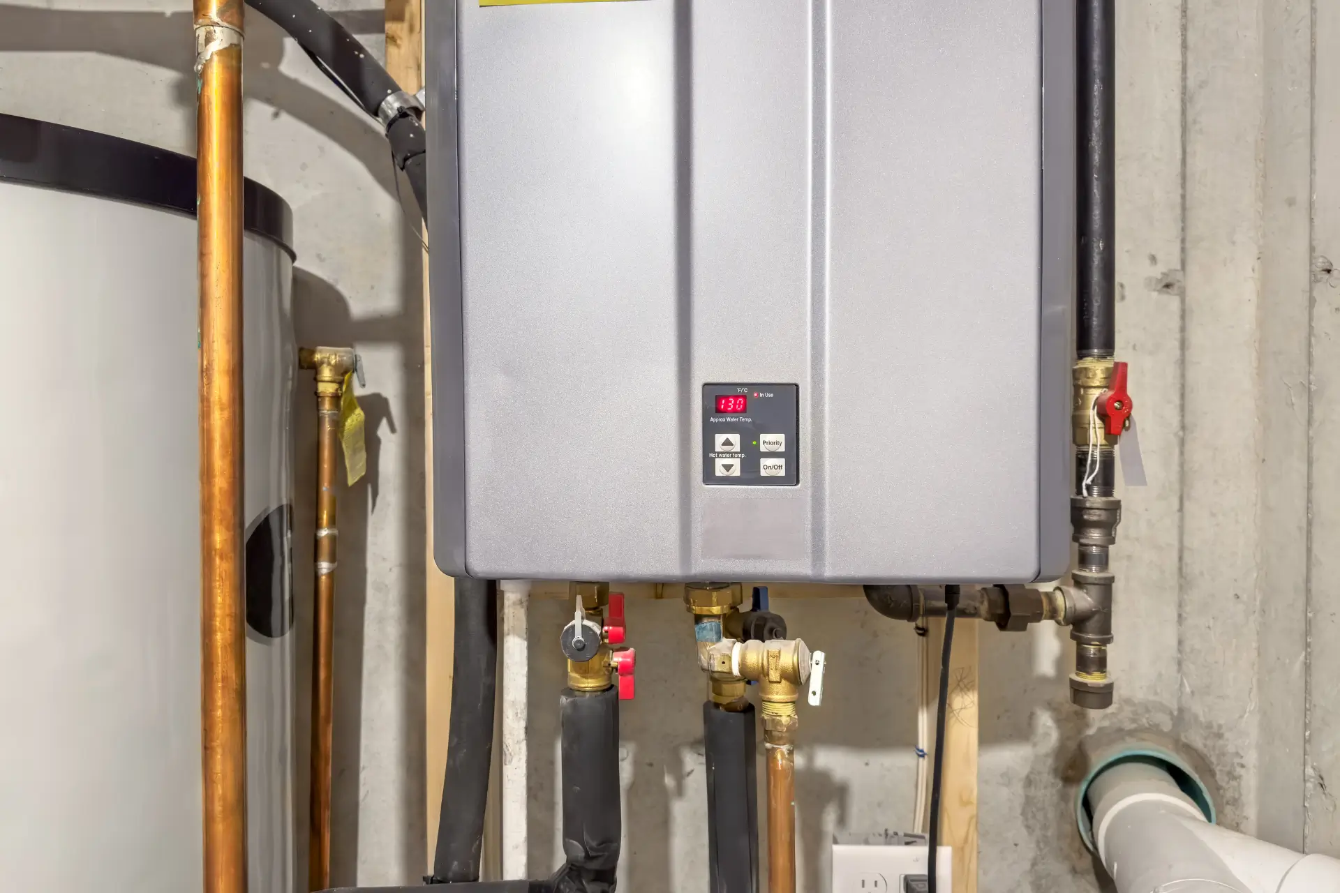 Tankless water heater mounted on a wall