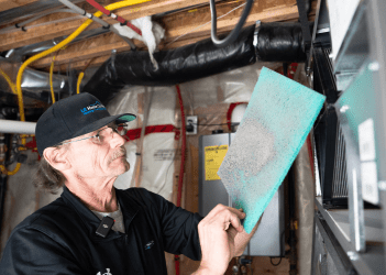 Newly installed air purifier working efficiently in a Hamilton living room - LG Home Comfort